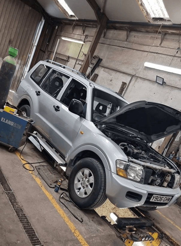 Mechanic working on a car